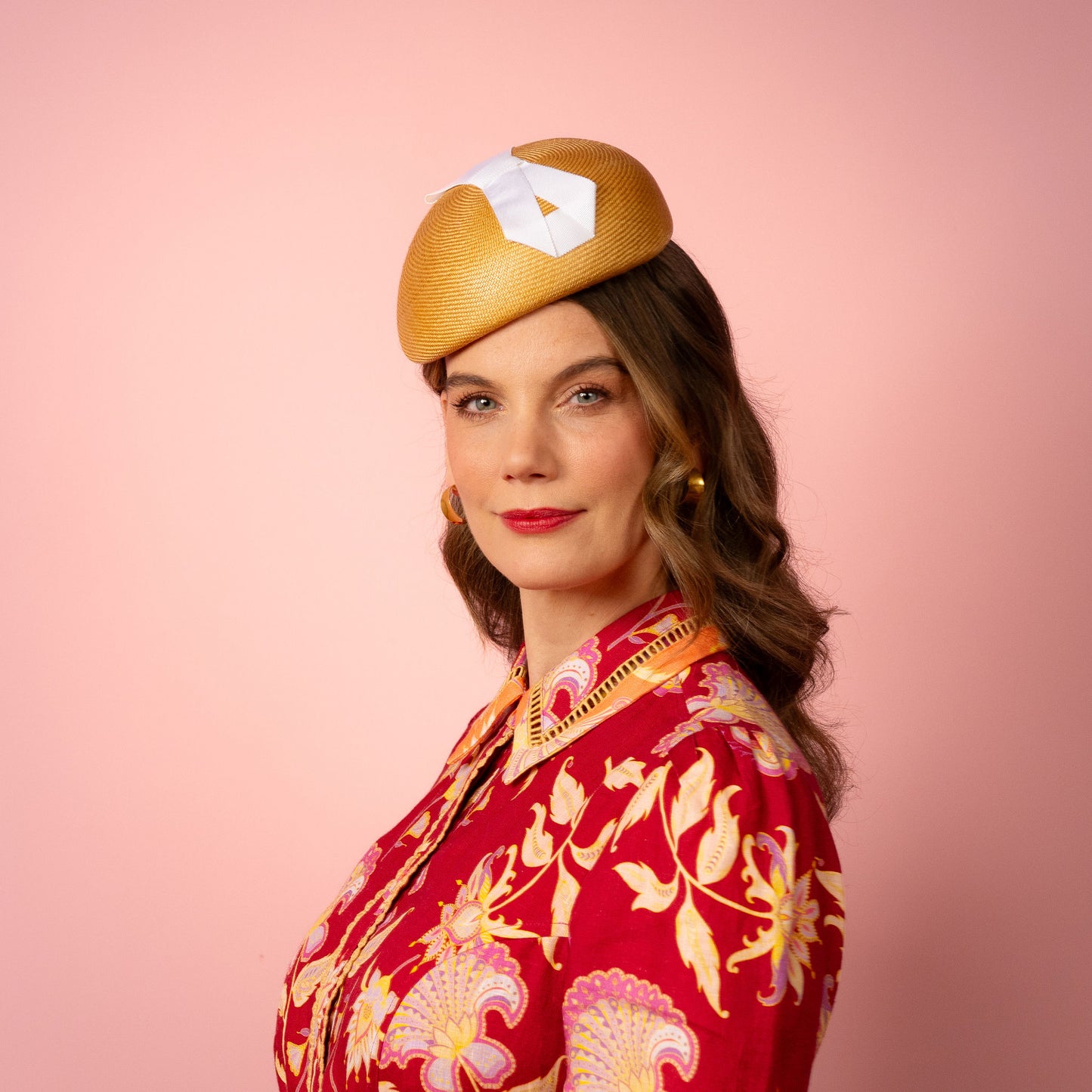 Evelyn Beret in gold straw with white infinity bow Spring Racing Headpiece