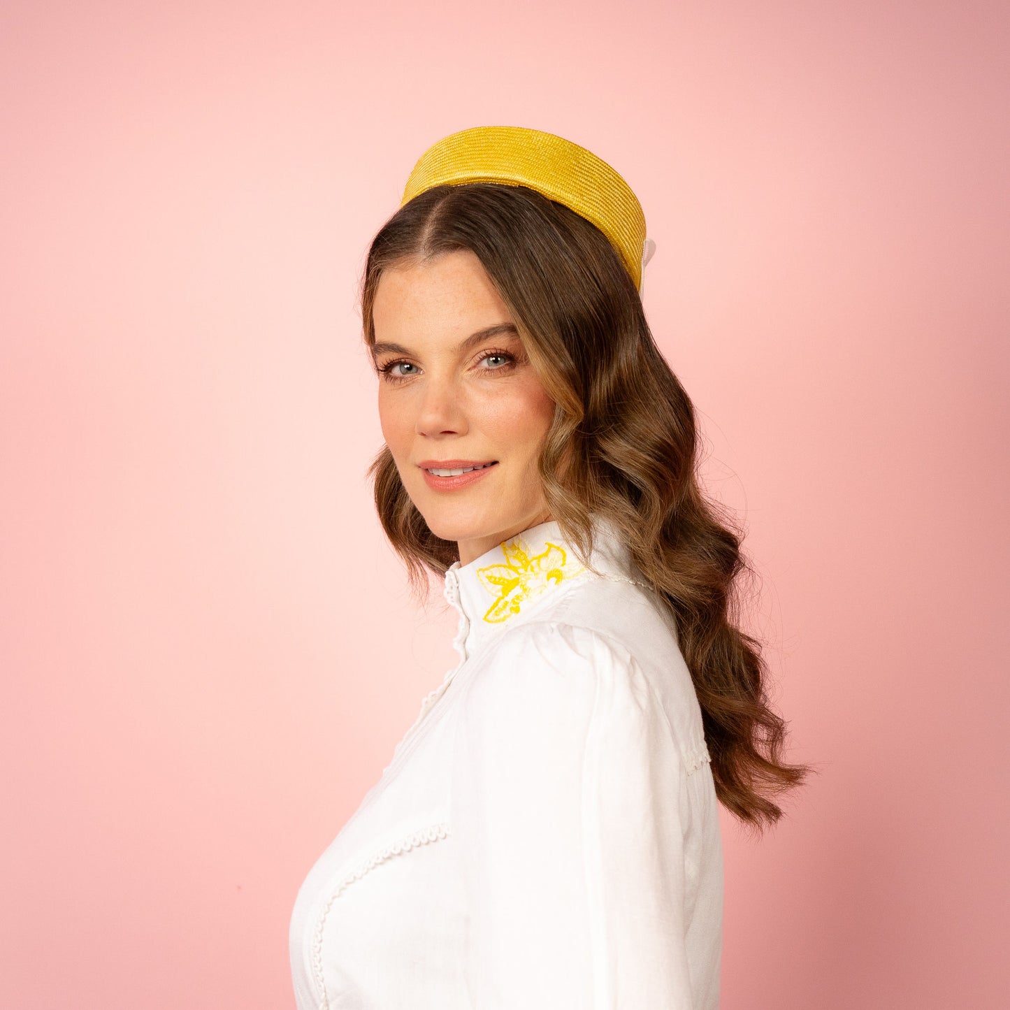 Peggy Pillbox in yellow straw with white petersham infinity bow Spring Racing Headpiece