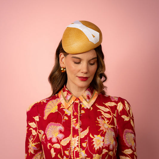 Evelyn Beret in gold straw with white infinity bow Spring Racing Headpiece