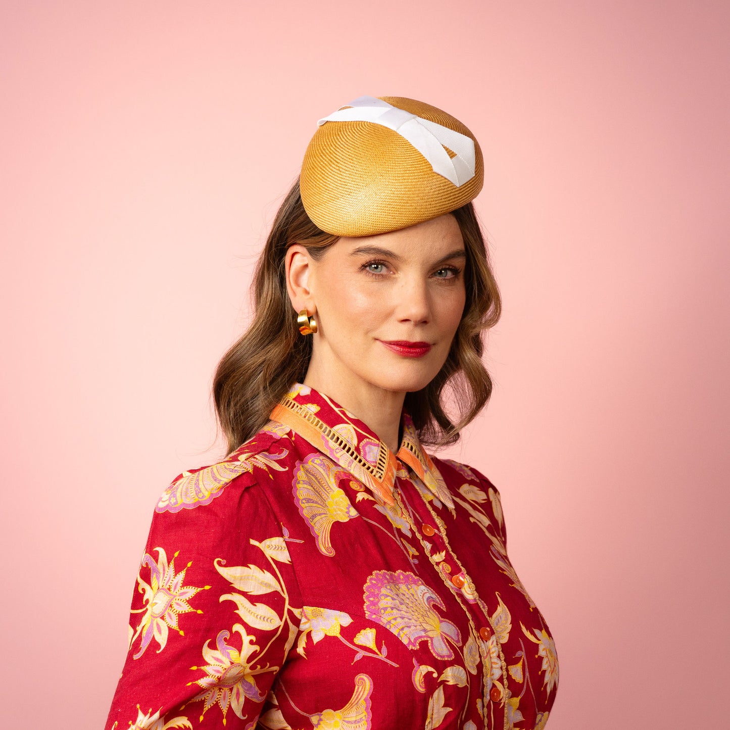 Evelyn Beret in gold straw with white infinity bow Spring Racing Headpiece