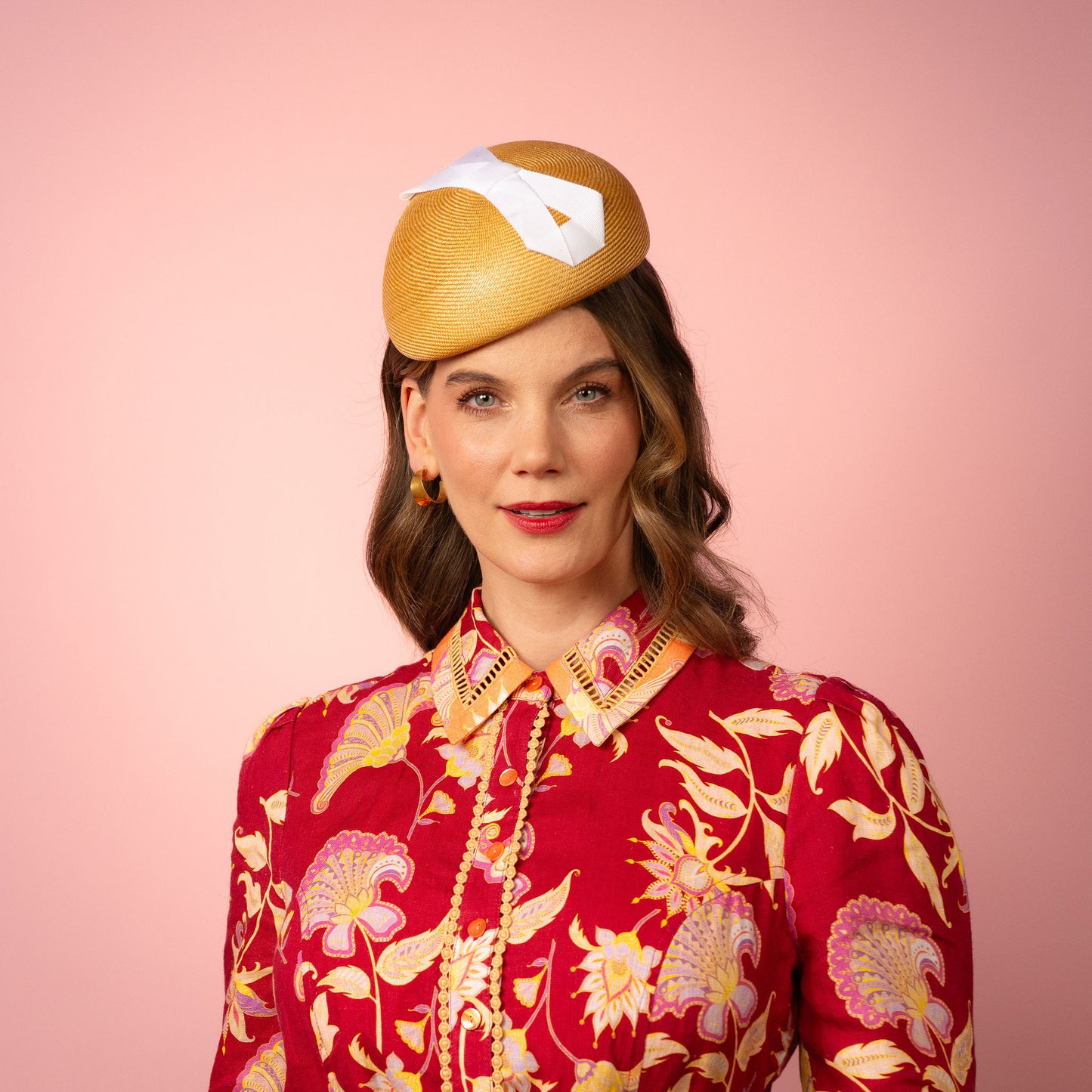 Evelyn Beret in gold straw with white infinity bow Spring Racing Headpiece