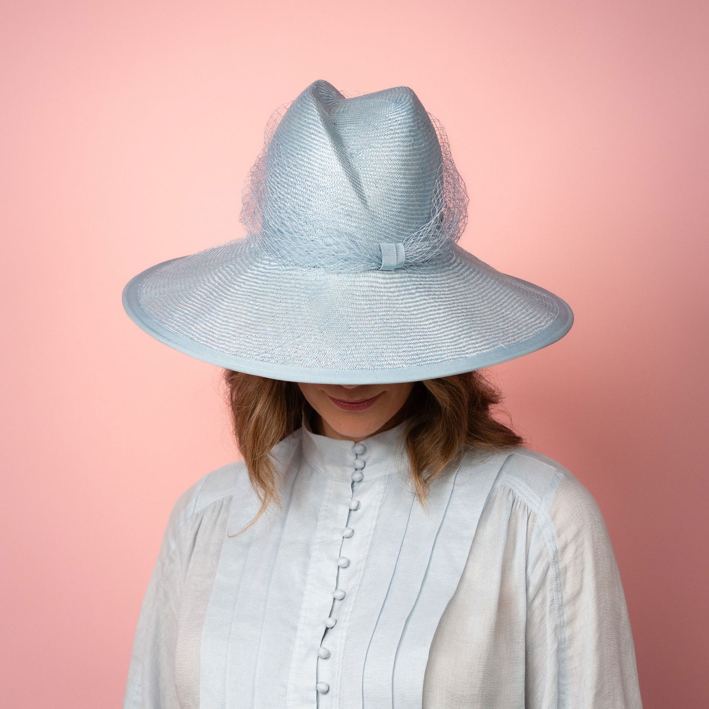 Isabella wide Brimmed hat with shaped crown in pale blue with veiling Spring Racewear Hat