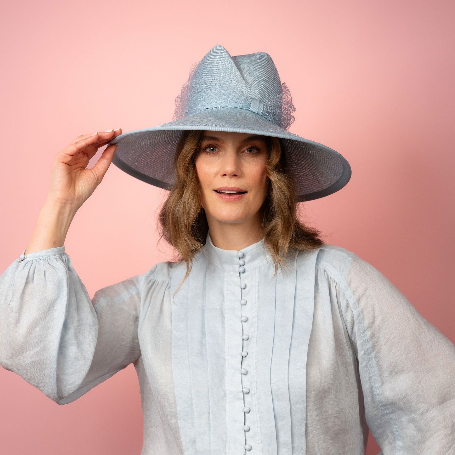 Isabella wide Brimmed hat with shaped crown in pale blue with veiling Spring Racewear Hat