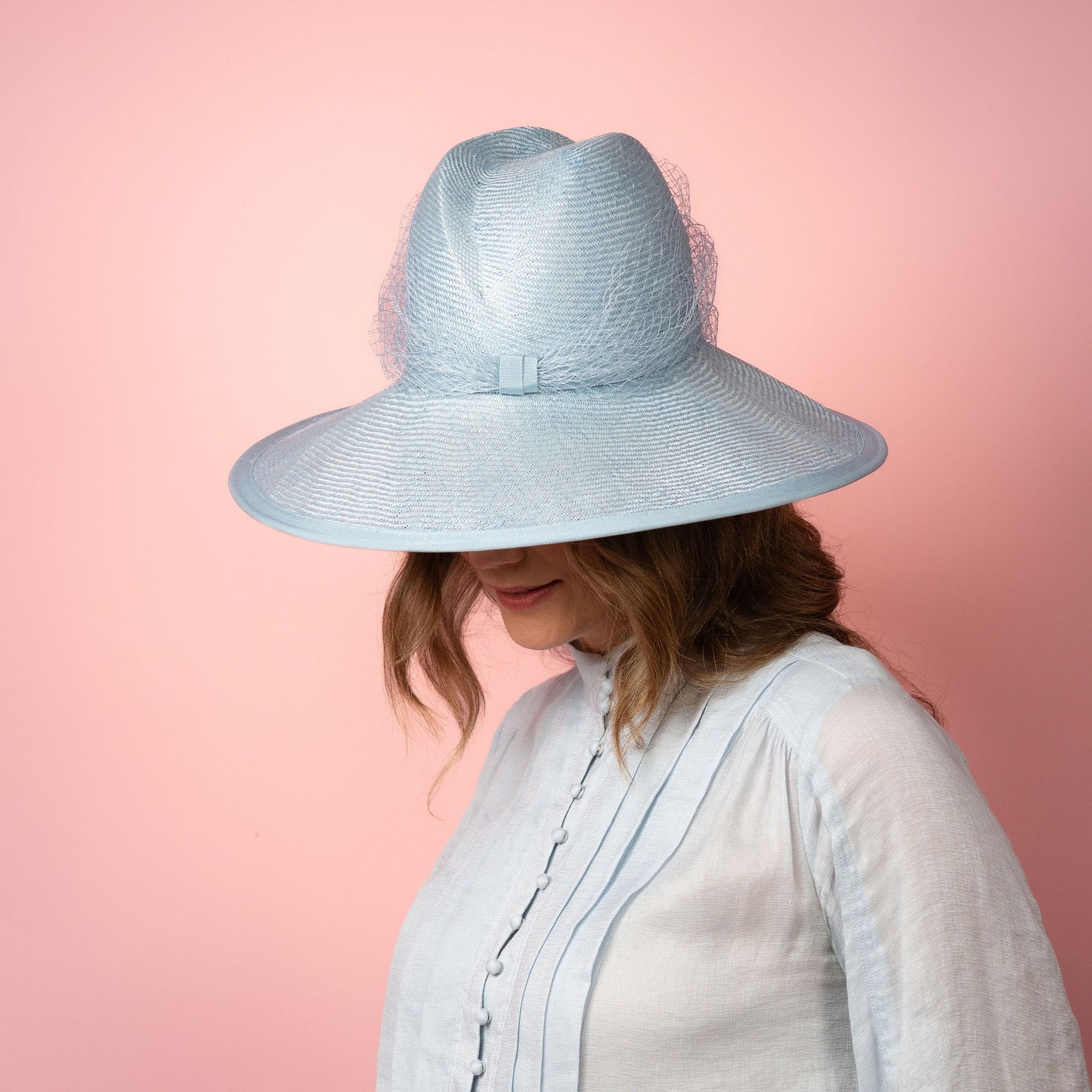 Isabella wide Brimmed hat with shaped crown in pale blue with veiling Spring Racewear Hat