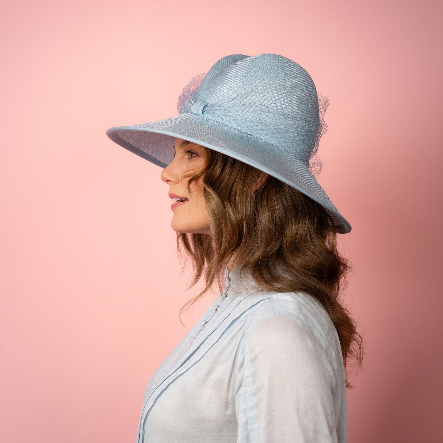 Isabella wide Brimmed hat with shaped crown in pale blue with veiling Spring Racewear Hat