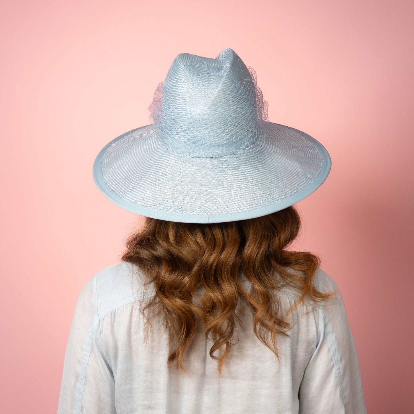 Isabella wide Brimmed hat with shaped crown in pale blue with veiling Spring Racewear Hat