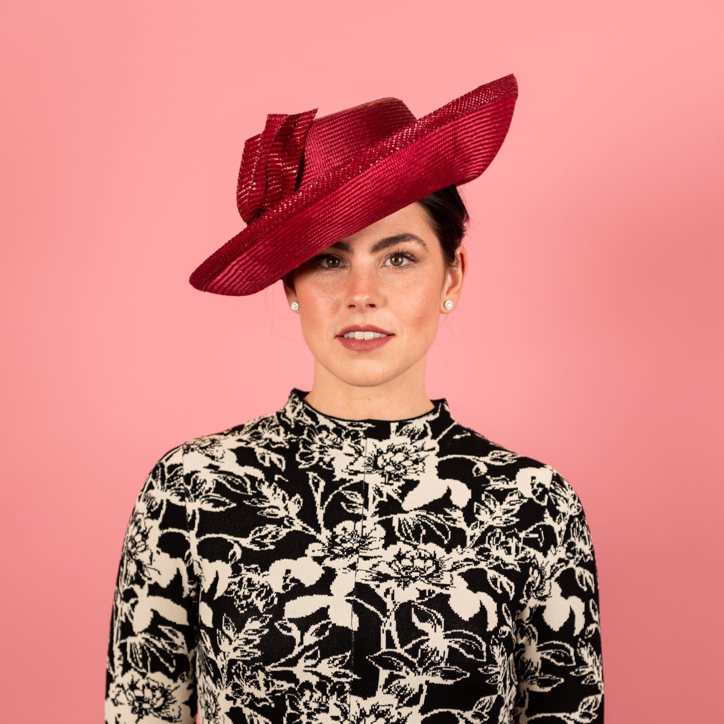 Mila Upturned Brimmed Straw Hat with Knotted Straw Braid Trim in Rasberry Red