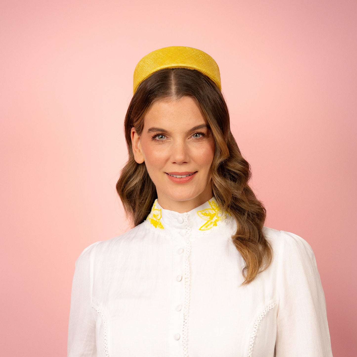 Peggy Pillbox in yellow straw with white petersham infinity bow Spring Racing Headpiece