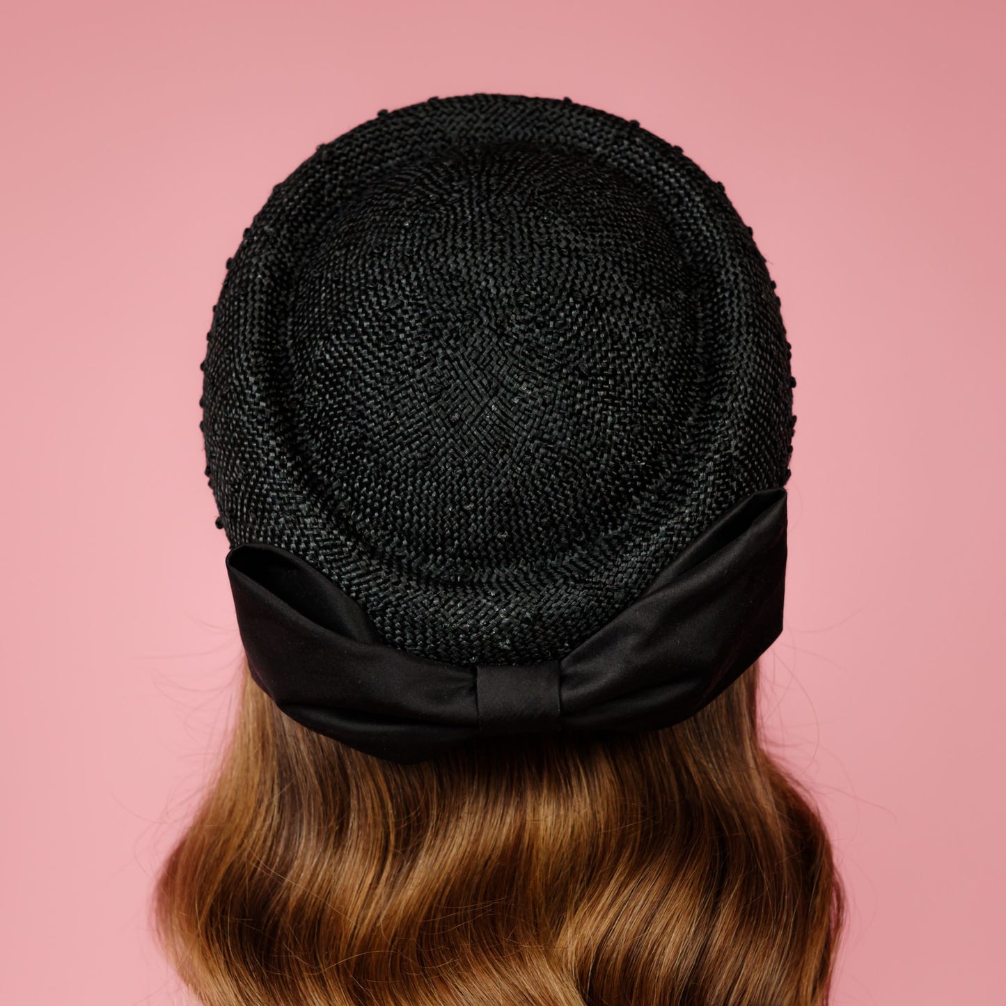 Taylor Pillbox in knotted straw with silk bow in black