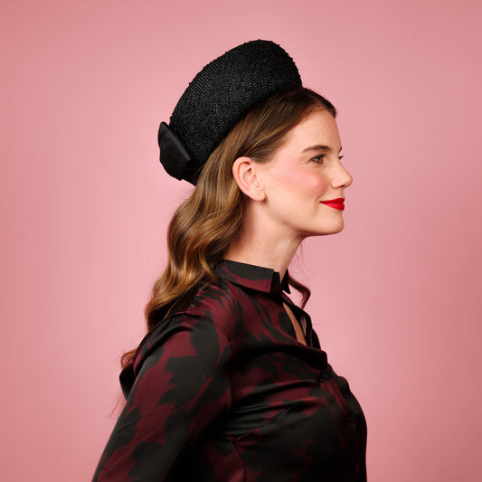 Taylor Pillbox in knotted straw with silk bow in black