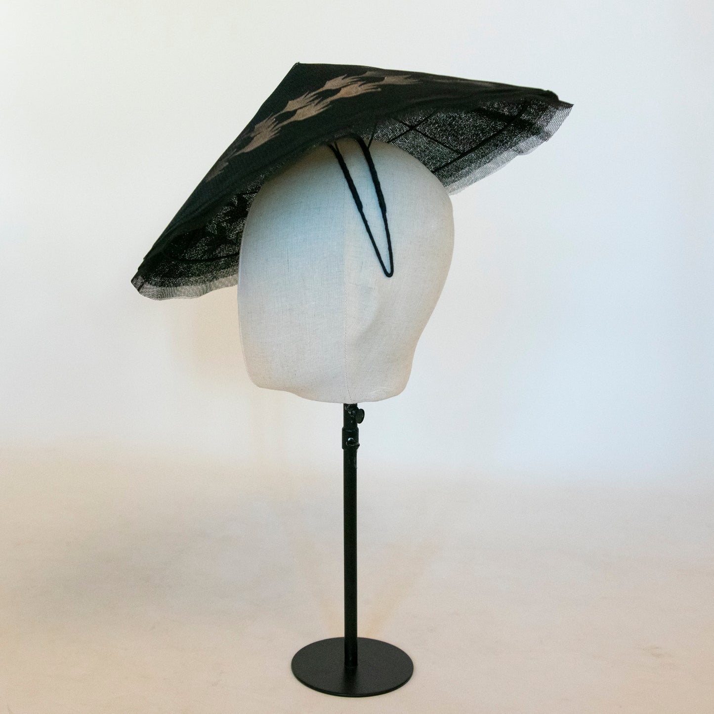 Tesselation in Flight Black Tulle Pitch Shape with Gold Bird Shape