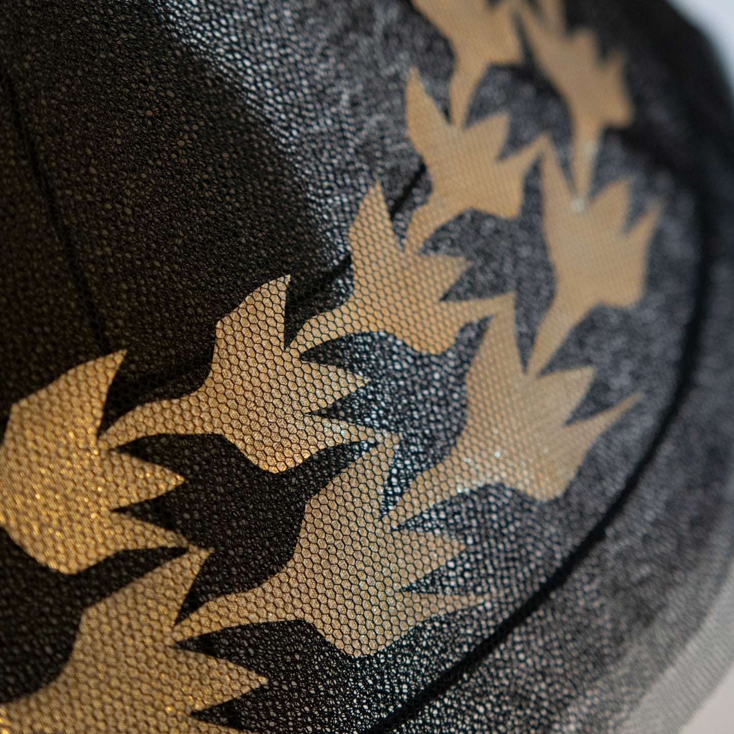 Tesselation in Flight Black Tulle Pitch Shape with Gold Bird Shape