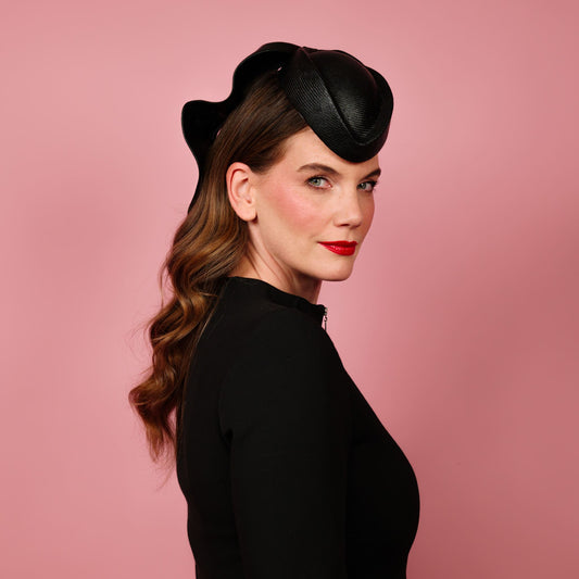 Zenith percher shaped straw headpiece with sculpted tails in black