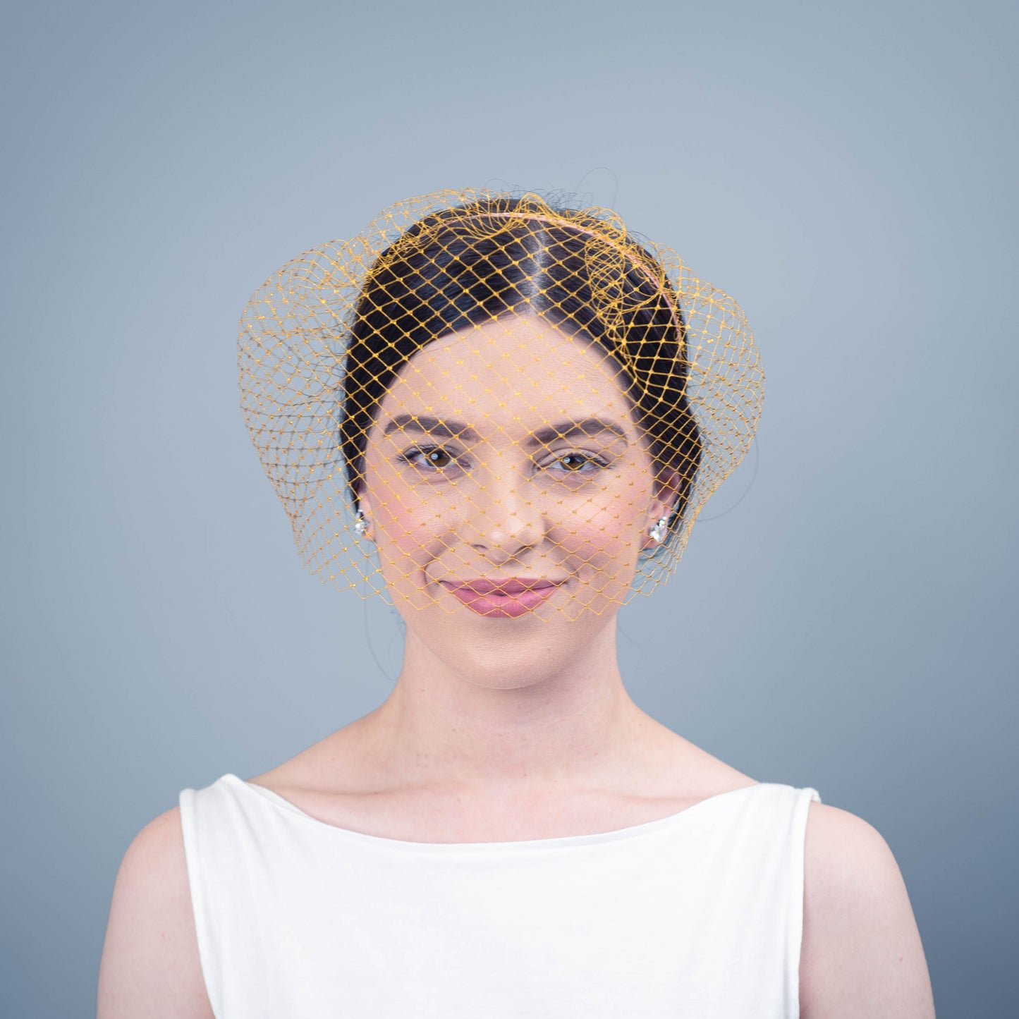 All of Me bridal birdcage veil on headband in gold veiling