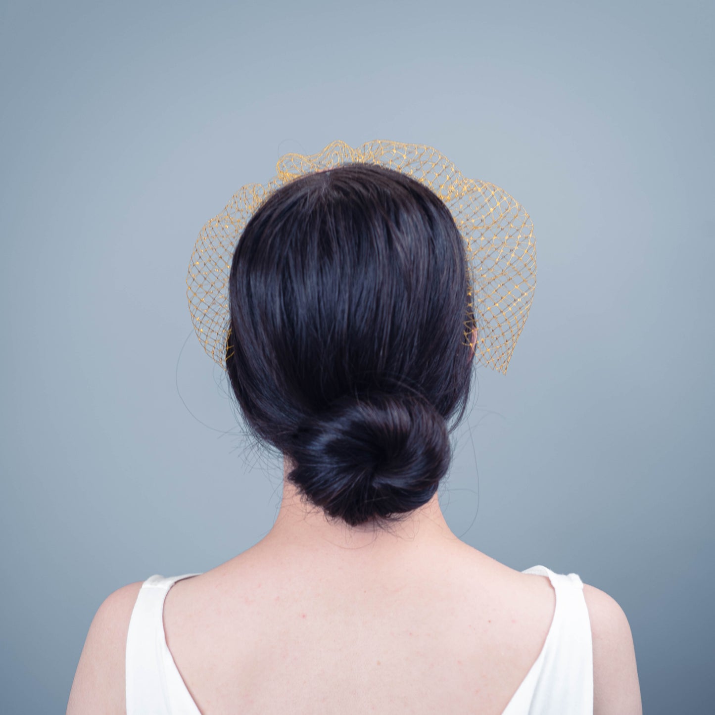 All of Me bridal birdcage veil on headband in gold veiling